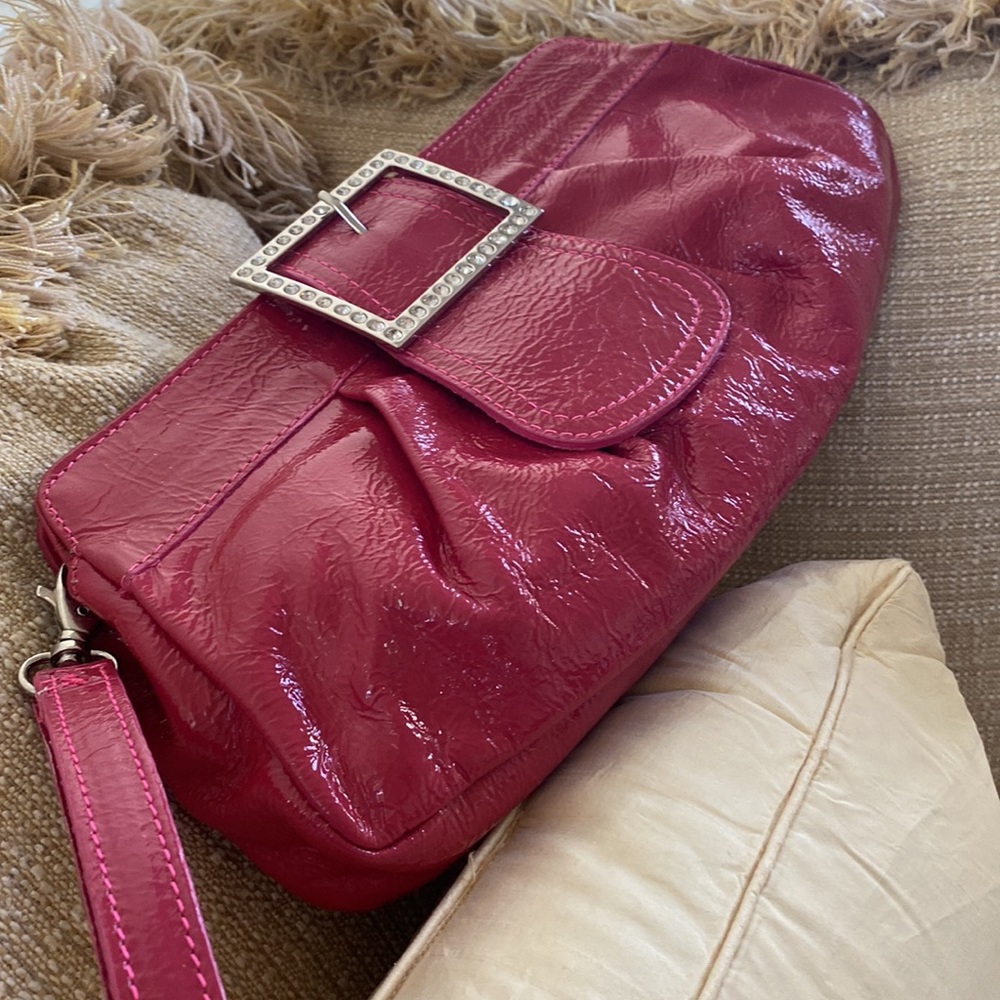 Pink clutch/purse with wristlet. 11x6